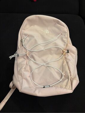 The North Face Jester Backpack in Light Pink with White Bungee